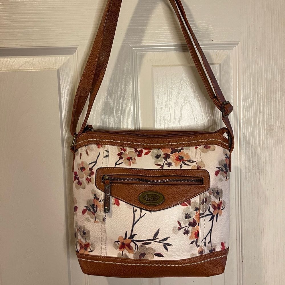 B.o.c Synthetic beige with floral prints and brown trims shoulder bag .